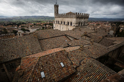 View of old town against cloudy sky