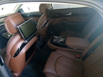 High angle view of woman sitting in car