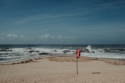 Scenic view of beach against sky