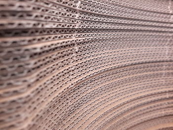 Full frame shot of stacked cardboard boxes in warehouse