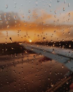 Full frame shot of wet glass window during rainy season