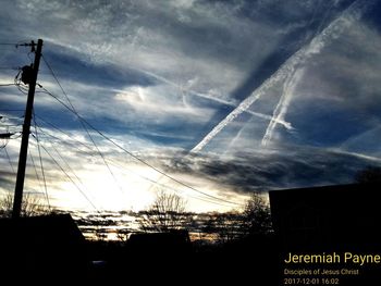 Low angle view of vapor trails in sky