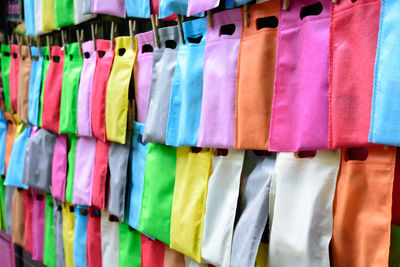 Full frame shot of colorful shopping bags for sale at market