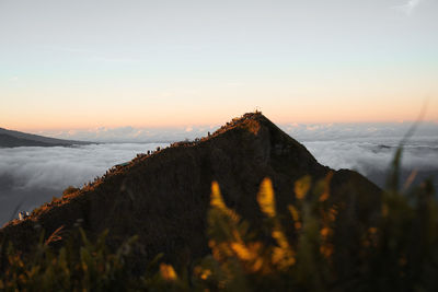 Scenic view of mountains against sky during sunset