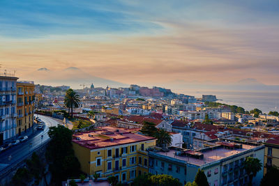 High angle view of cityscape against sky during sunset