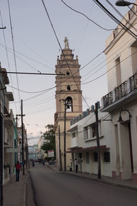 Church in city against sky