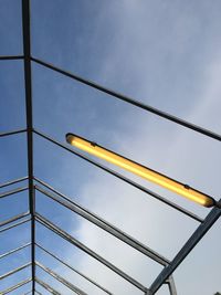 Low angle view of street light against sky