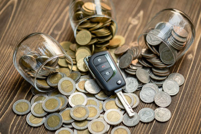 High angle view of coins on table