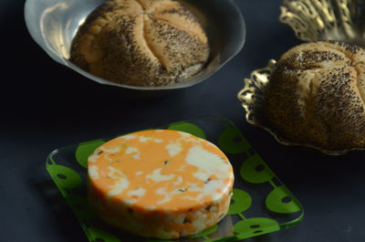 High angle view of on cheese and buns on table