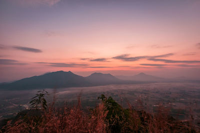 Scenic view of landscape against sky during sunset