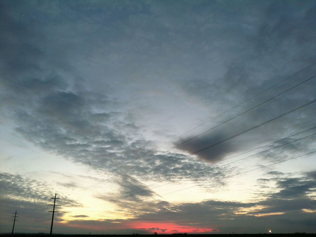 SILHOUETTE OF TREES AGAINST CLOUDY SKY