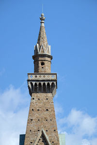The bell tower of basilica of santa croce famous franciscan church in florence, italy
