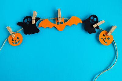 Close-up of toys against blue background