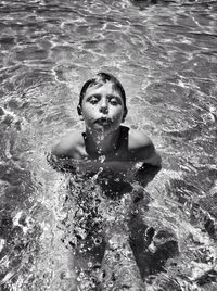 Portrait of woman in water