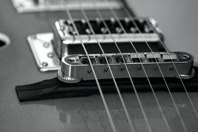 Close-up of guitar on table