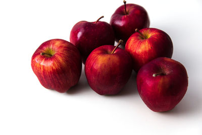 High angle view of apples on apple against white background