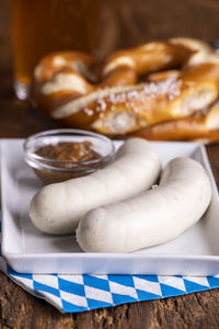 Close-up of donuts in plate on table