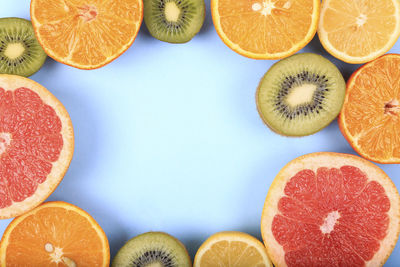 Close-up of oranges against white background