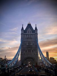 View of bridge against cloudy sky