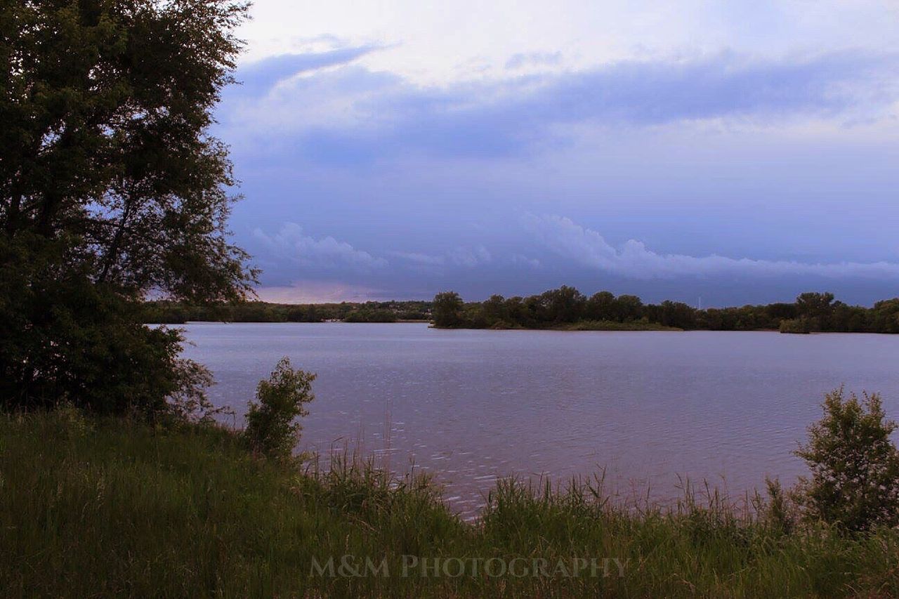 SCENIC VIEW OF LAKE AGAINST TREES