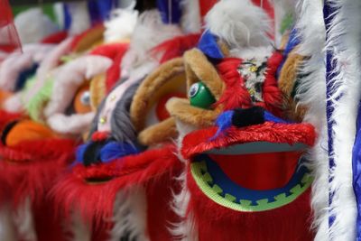 Close-up of chinese dragon masks for sale in market