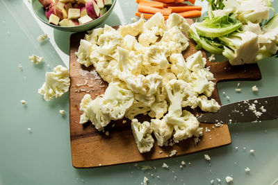 High angle view of chopped vegetables on table