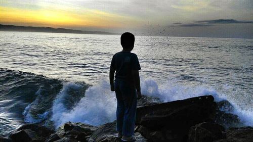 Scenic view of sea at sunset