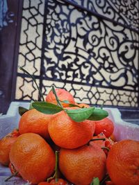 Close-up of orange fruits on table