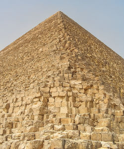 Low angle view of old ruins against sky