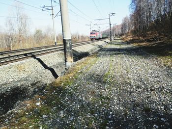 Train on railroad track against sky