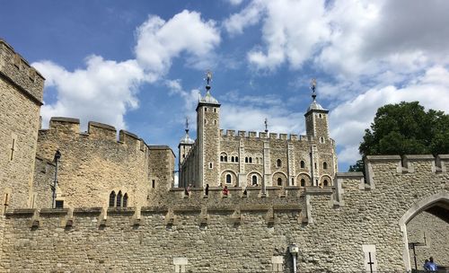 Low angle view of buildings against sky tower of london