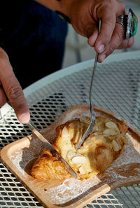 Midsection of person preparing food