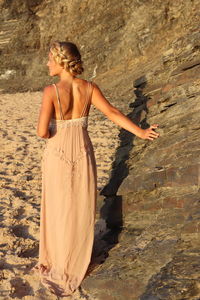 Woman standing on rock