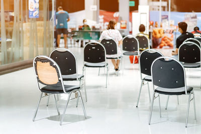 View of people sitting on chairs at restaurant