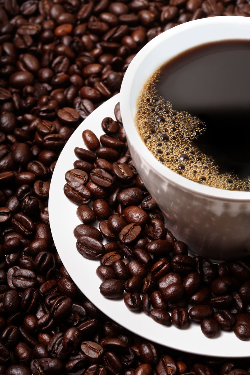 coffee - drink, coffee, food and drink, roasted coffee bean, drink, coffee cup, refreshment, cup, food, mug, brown, freshness, still life, indoors, close-up, coffee bean, no people, high angle view, large group of objects, table, caffeine, crockery, latte