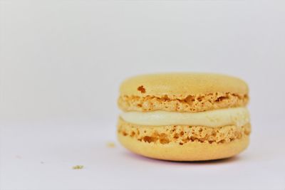 Close-up of cake against white background