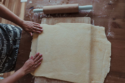 Midsection of woman preparing food