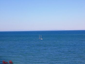 Scenic view of blue sea against sky