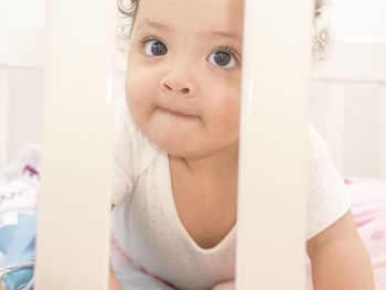 Portrait of cute baby at home