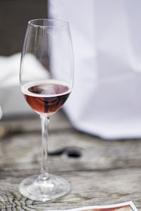 Close-up of wine in glass on table