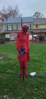 Full length of man standing on field against building