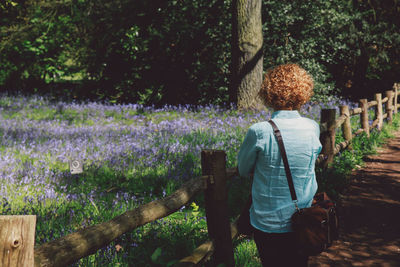 Woman standing on field