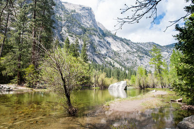 Scenic view of river and mountains