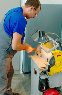 Manual worker working at shop