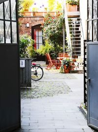 Bicycle on sidewalk by building