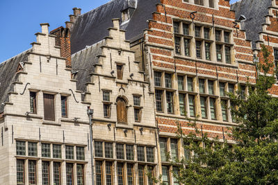 Low angle view of old building in city