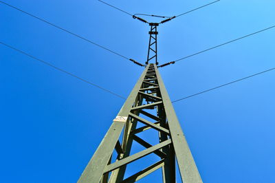 Low angle view of tower against clear blue sky