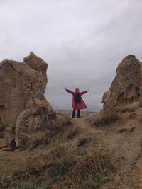 Woman jumping on mountain