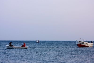 Boat sailing in sea