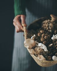Close-up of person preparing food on table